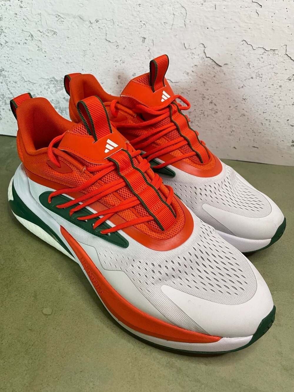 Adidas Miami Hurricanes AlphaBoost V2 Shoes White Orange Green